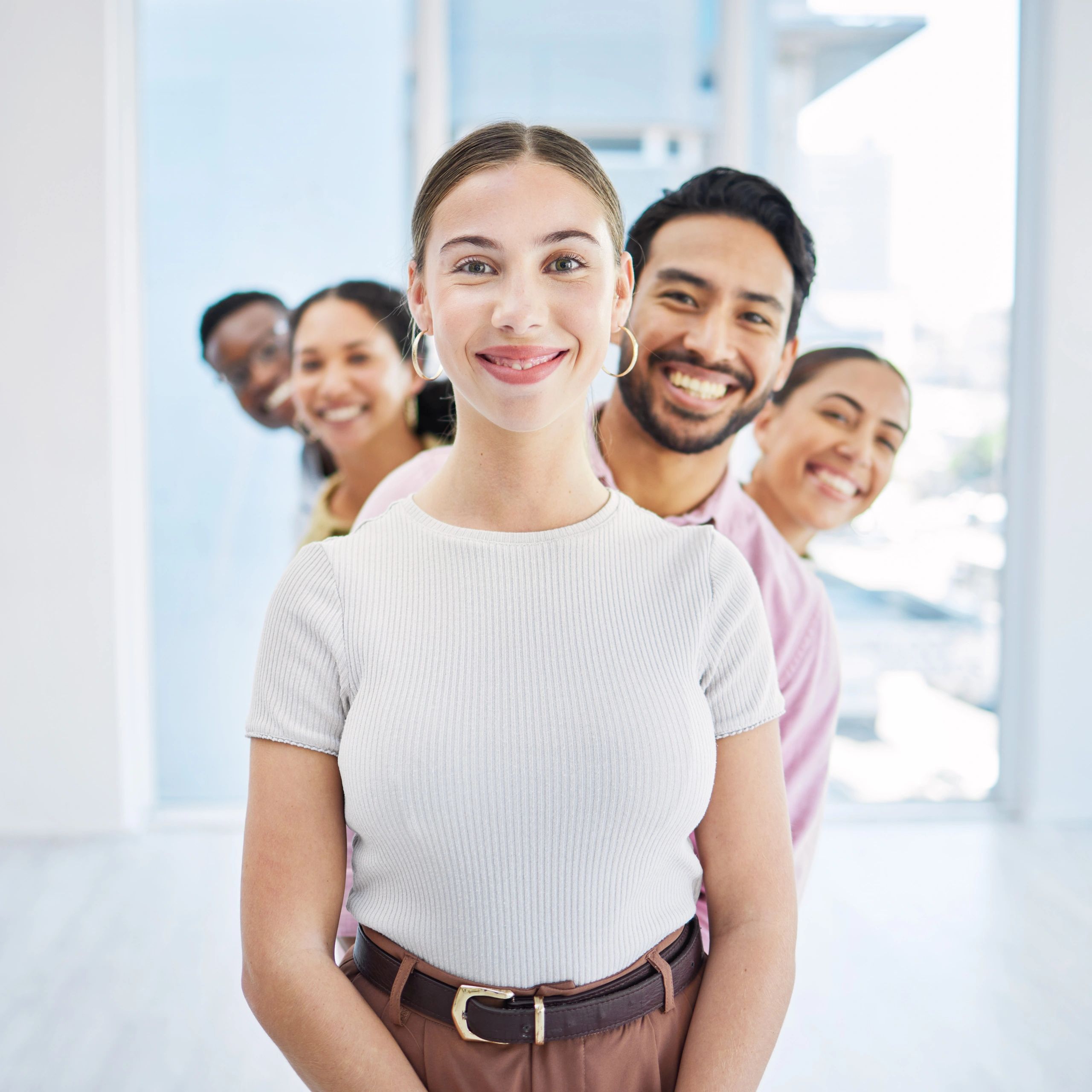 Smiling professionals in modern office